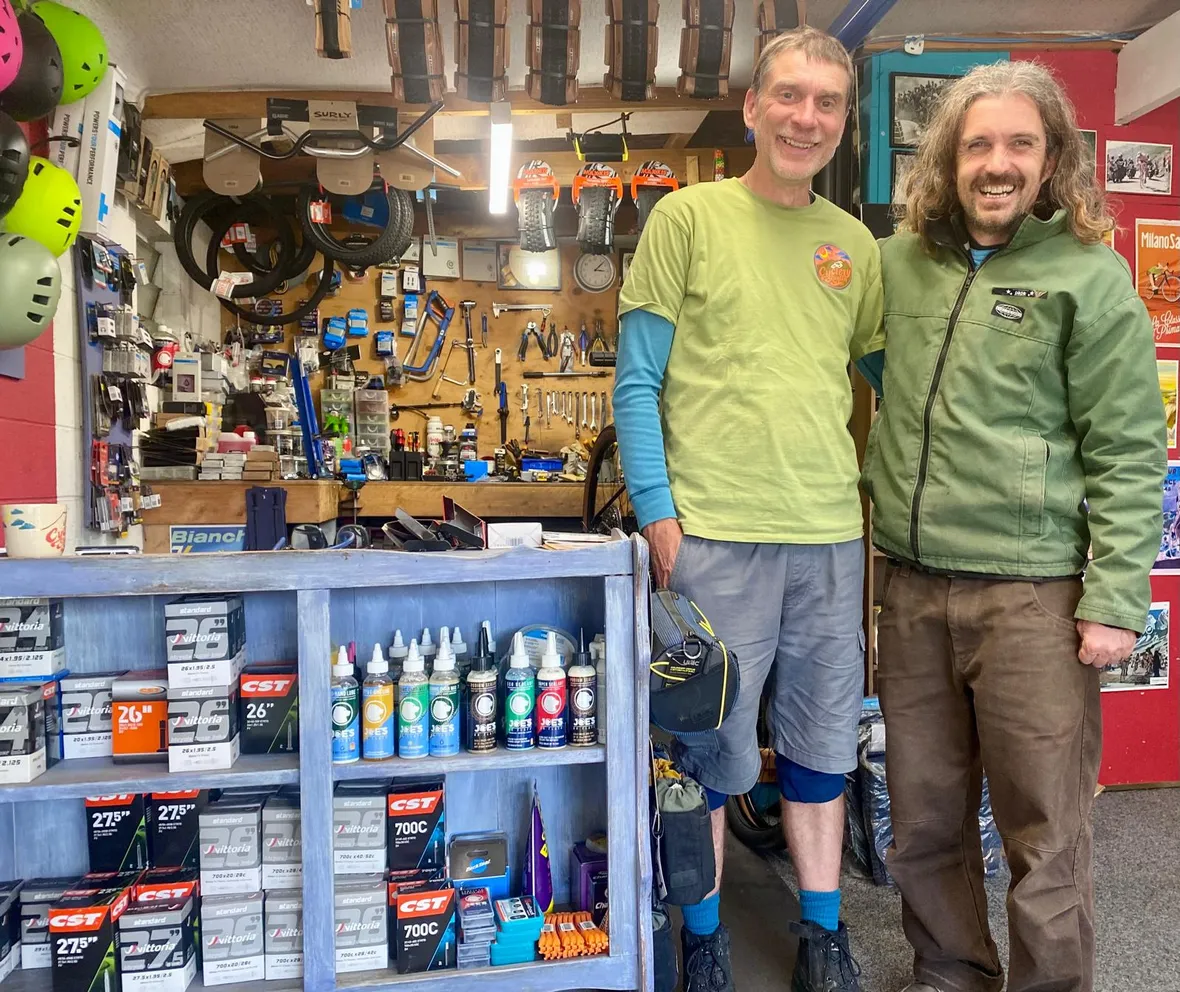 Dirk, owner of Raglan Cyclery, working as a mechanic